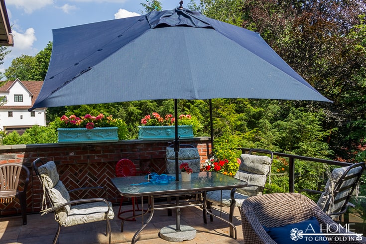 This tasseled outdoor umbrella is a great way to get a high-end look for less! It's an easy and inexpensive DIY that saved me over $800!