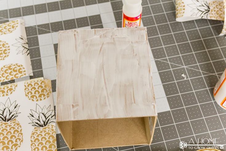 This beautiful tissue box is an easy and inexpensive DIY update that can be customized to fit the decor of any room in your home! No more ugly tissue boxes! Pin it now so you don't forget it when you need it!