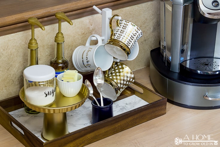 This is such an easy way to set up a coffee station in your kitchen! Lots of great ideas on how to create your own.  Perfect for the cold weather season!  You'll want to pin this for later!