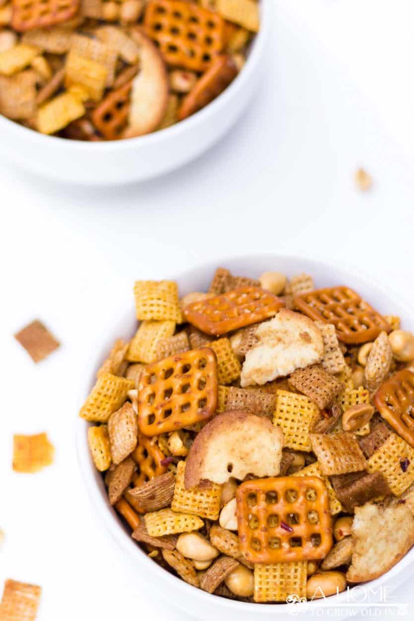 Looking for the ultimate snack recipe for your football watching party? This spicy Sriracha Chex mix recipe has just the right amount of heat! It is sure to be a game-day favorite.