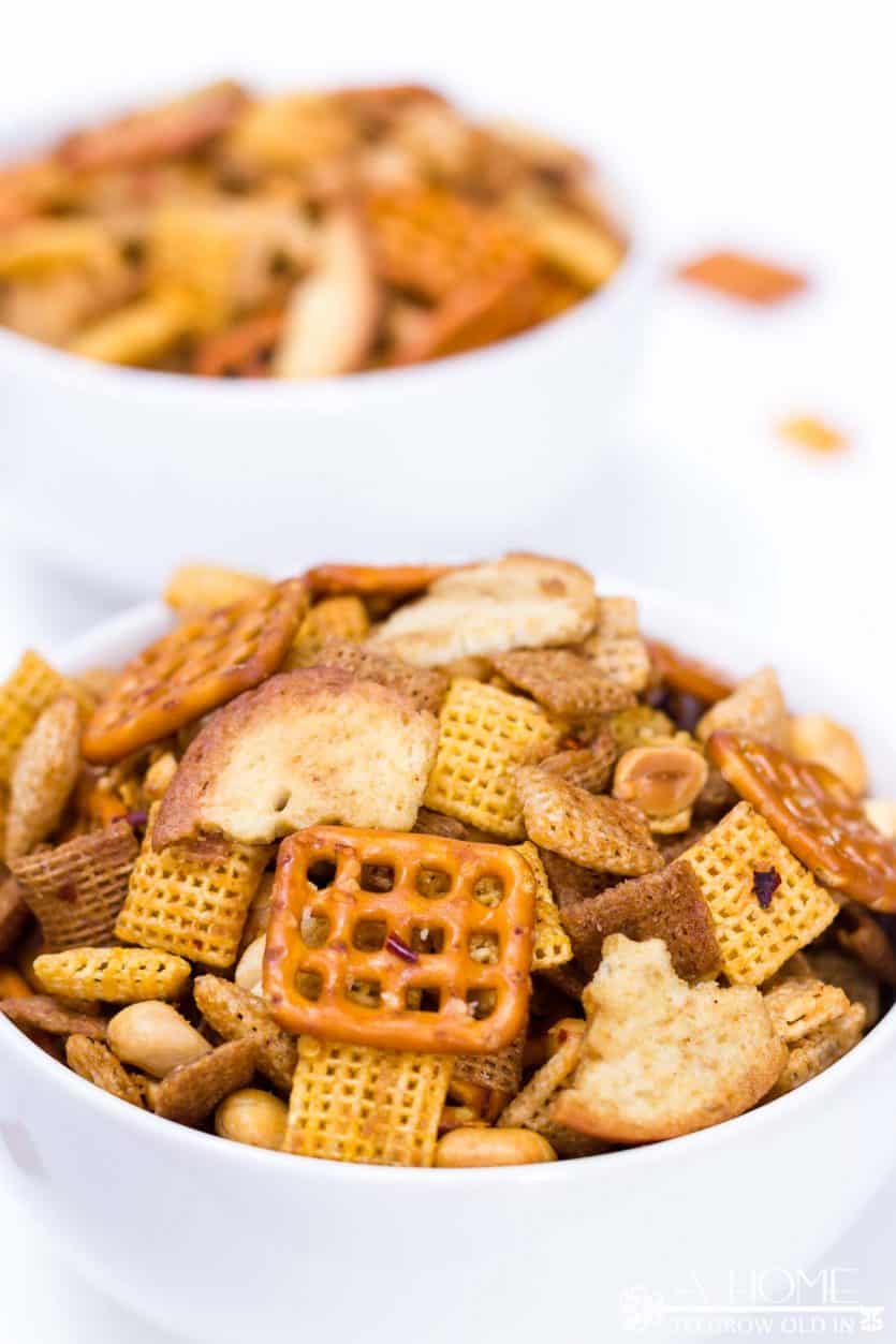 Looking for the ultimate snack recipe for your football watching party? This spicy Sriracha Chex mix recipe has just the right amount of heat! It is sure to be a game-day favorite.