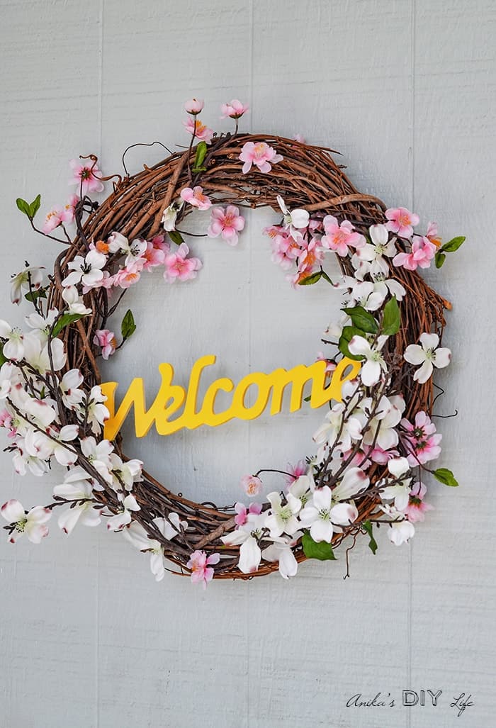 spring wreath made from grapevine with cherry blossoms