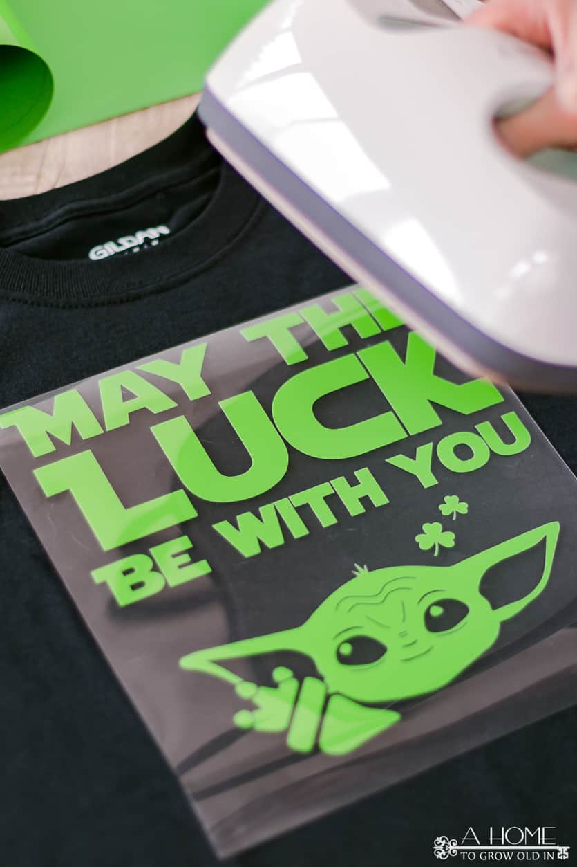 applying Star Wars svg to t-shirt with heat press