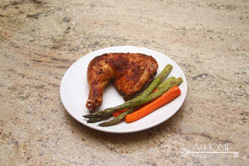 plated roasted chicken with veggies